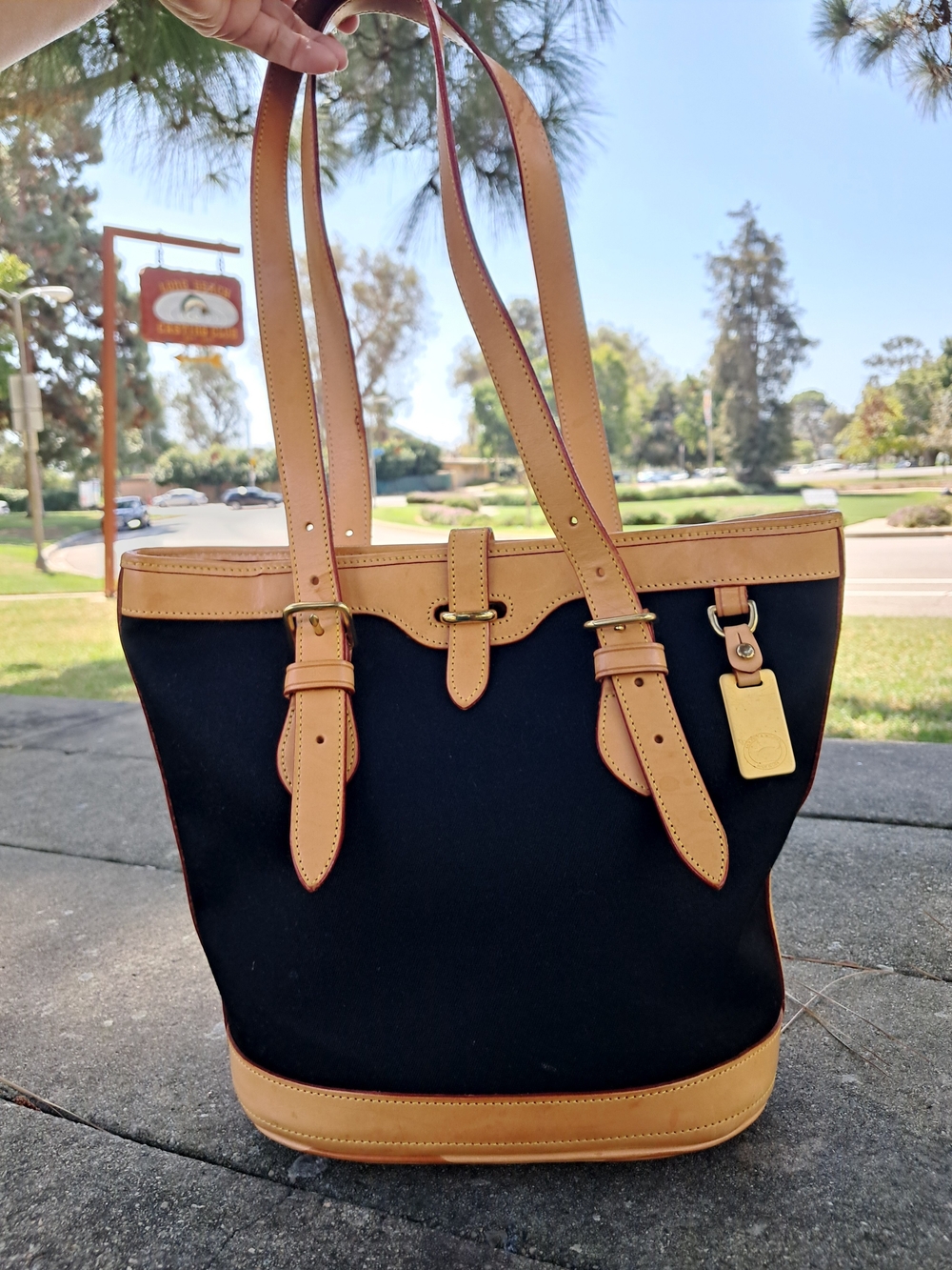 Dooney & Bourke Black and Tan Leather Trim Tote Bag